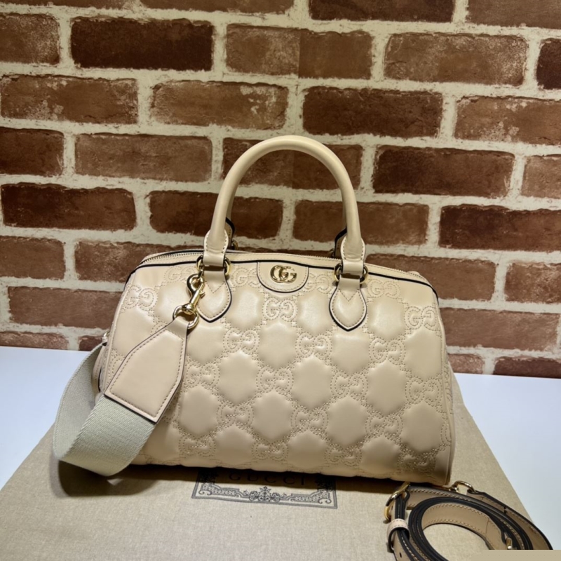 G*u*i top handle bags